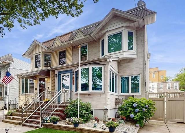 Property at 77-52 76th St, Glendale, NY 11385, 3 beds, 2 baths