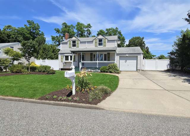 Property at 73 Peconic St, Selden, NY 11784, 4 beds, 2 baths
