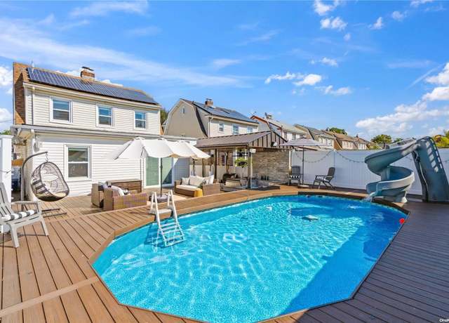 Property at 92-52 219th St, Queens Village, NY 11428, 4 beds, 2 baths