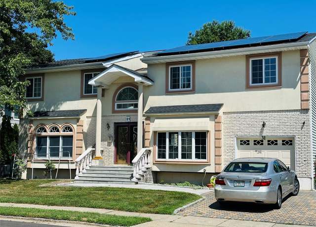 Property at 31 Woodward St, Roslyn Heights, NY 11577, 4 beds, 2.5 baths