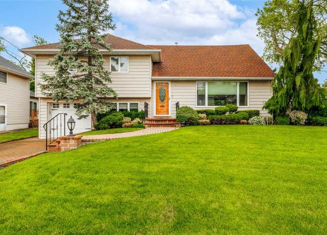 Property at 168 W Henrietta Ave, Oceanside, NY 11572, 4 beds, 2.5 baths