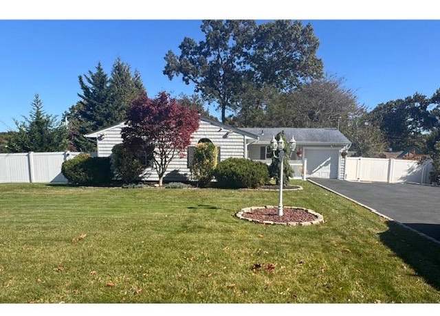 Property at 63 Avenue D, Farmingville, NY 11738, 4 beds, 2.5 baths