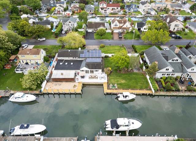 Property at 11 Stuart Ave, Amityville, NY 11701, 5 beds, 2.5 baths