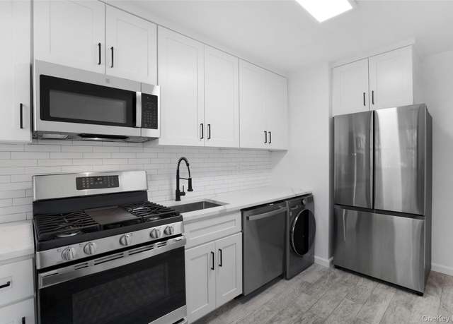 Property at 74-56 220 St Unit 1st Floor, Bayside, NY 11364, 2 beds, 1 bath
