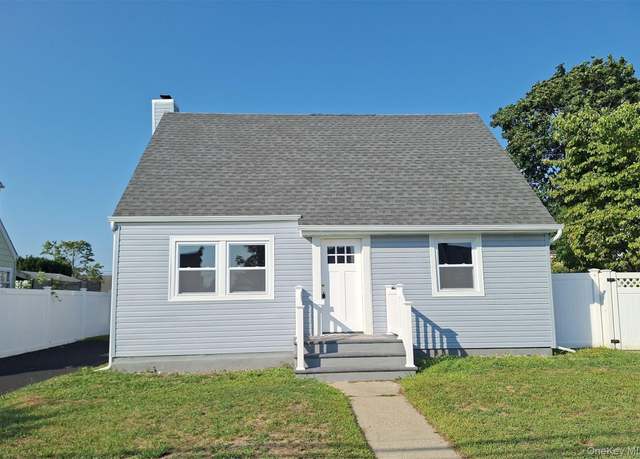 Property at 1067 Mirabelle Ave, Westbury, NY 11590, 4 beds, 2 baths