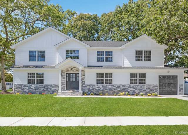 Property at 104 Grand Blvd, Massapequa Park, NY 11762, 5 beds, 3 baths