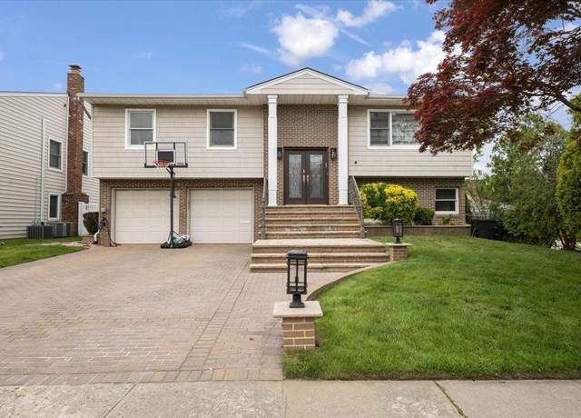 Property at 432 Rugby Rd, Cedarhurst, NY 11516, 4 beds, 3 baths