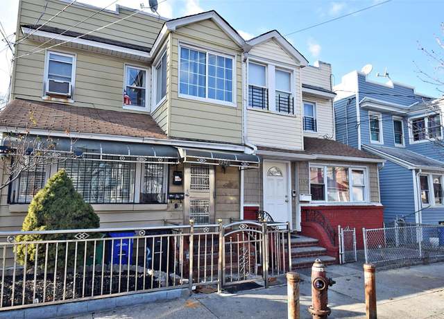 Property at 93-28 74th Pl, Woodhaven, NY 11421, 4 beds, 3 baths