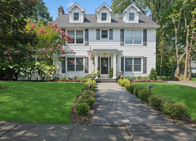 Property at 91 Poplar St, Garden City, NY 11530, 4 beds, 3.5 baths