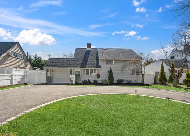 Property at 136 Land Ln, Westbury, NY 11590, 4 beds, 2 baths