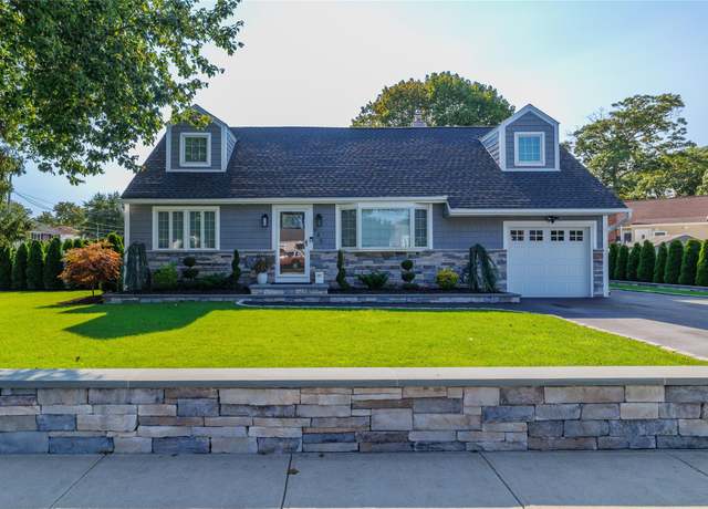 Property at 645 Hawkins Blvd, Copiague, NY 11726, 4 beds, 2 baths