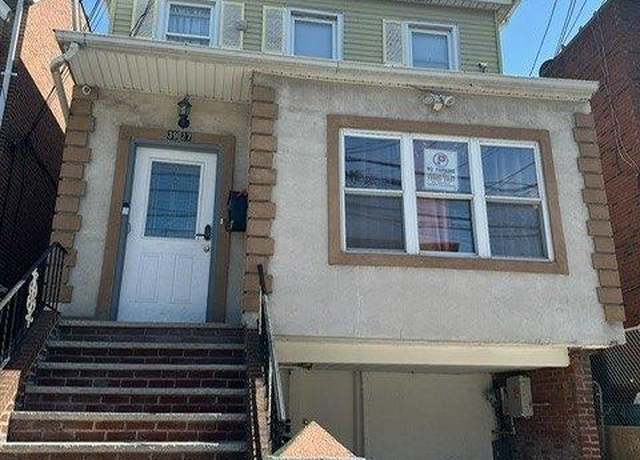 Property at 39-27 56th St, Woodside, NY 11377, 4 beds, 3 baths