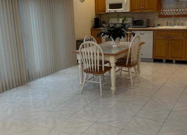 Property at 16407 95th St, Howard Beach, NY 11414, 3 beds, 4.5 baths