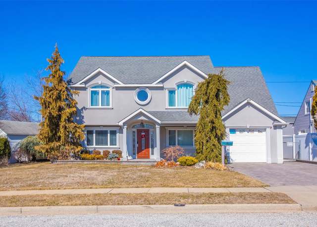 Property at 9 Book Ln, Levittown, NY 11756, 4 beds, 2 baths