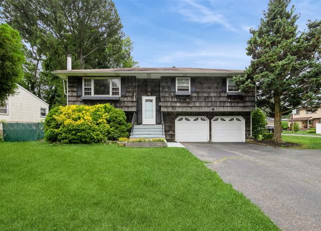 Property at 180 Hunter Ave, North Babylon, NY 11703, 4 beds, 2 baths