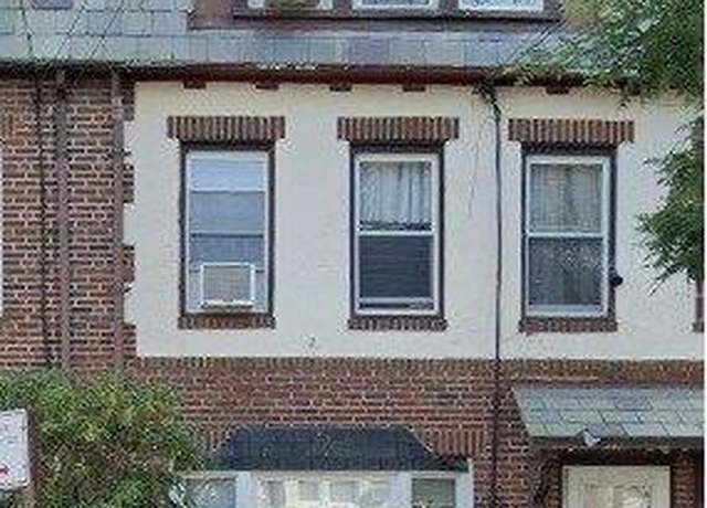 Property at 72-46 Manse St, Forest Hills, NY 11375, 5 beds, 3 baths