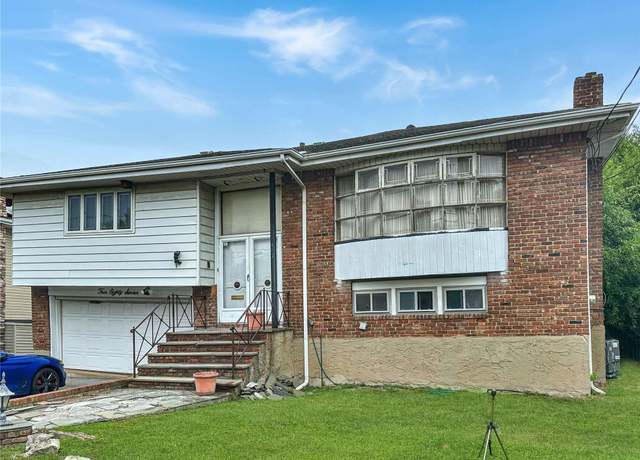 Property at 487 Links Dr, Oceanside, NY 11572, 4 beds, 4 baths