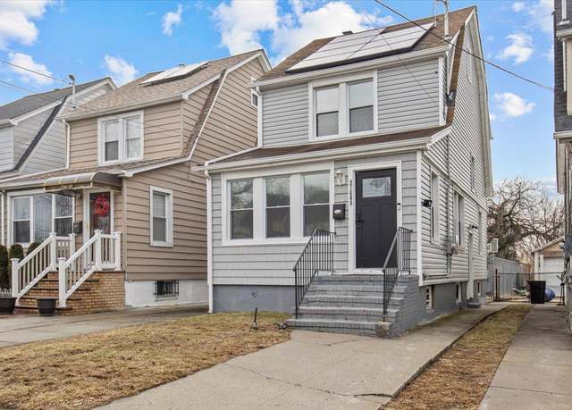 Property at 21608 115th Rd, Cambria Heights, NY 11411, 4 beds, 2.5 baths