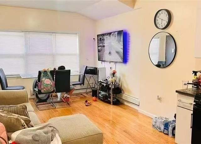 Property at 12318 85th Ave Ave, Kew Gardens, NY 11415, 4 beds, 3 baths