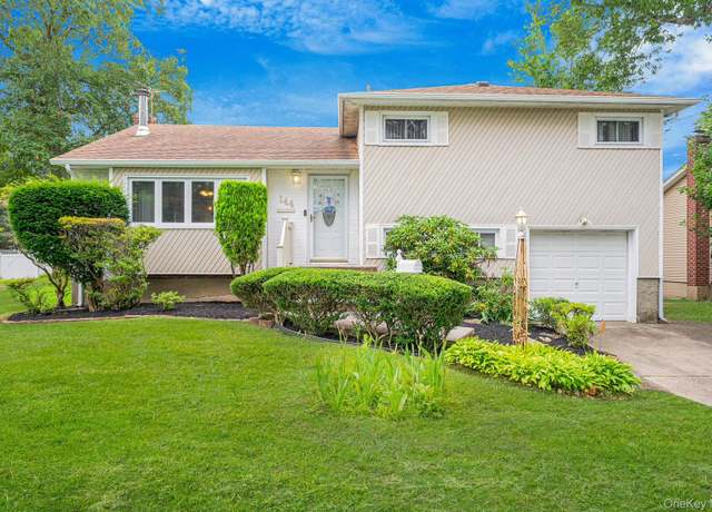 Property at 144 Scott Ave, North Babylon, NY 11703, 4 beds, 2 baths