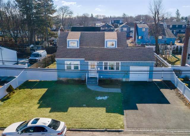 Property at 230 Ackerman St, Central Islip, NY 11722, 4 beds, 2 baths