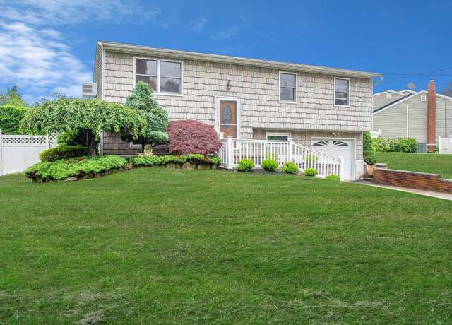 Property at 104 Cedarhurst Ave, Selden, NY 11784, 4 beds, 1.5 baths