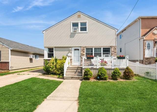 Property at 62 Warwick Rd, Island Park, NY 11558, 4 beds, 2.5 baths