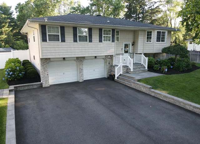 Property at 4 Kirkland Dr, Greenlawn, NY 11740, 4 beds, 3 baths
