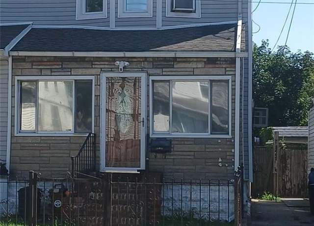 Property at 89-27 91st St, Woodhaven, NY 11421, 4 beds, 2.5 baths