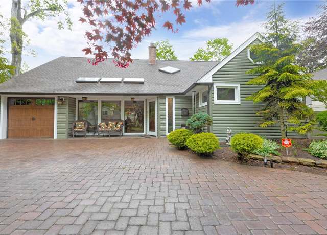 Property at 5 Oak Brook Ln, Merrick, NY 11566, 5 beds, 3 baths