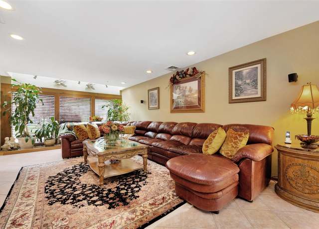 Property at 5 Oak Brook Ln, North Merrick, NY 11566, 6 beds, 3 baths