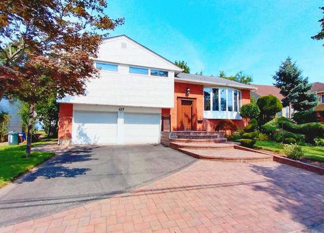 Property at 417 Bunker Dr, Oceanside, NY 11572, 4 beds, 3 baths