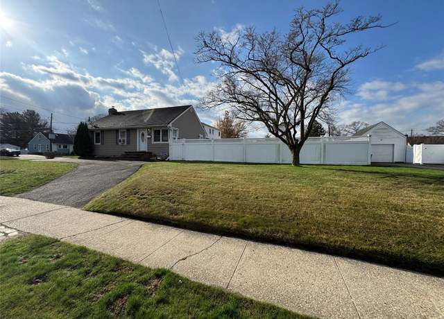Property at 76 Parkdale Dr, North Babylon, NY 11703, 3 beds, 2 baths