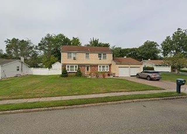 Property at 38 Tulip Grove Dr, Lake Grove, NY 11755, 4 beds, 3.5 baths