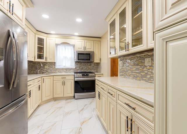 Property at 14827 230th Pl, Rosedale, NY 11413, 5 beds, 3 baths