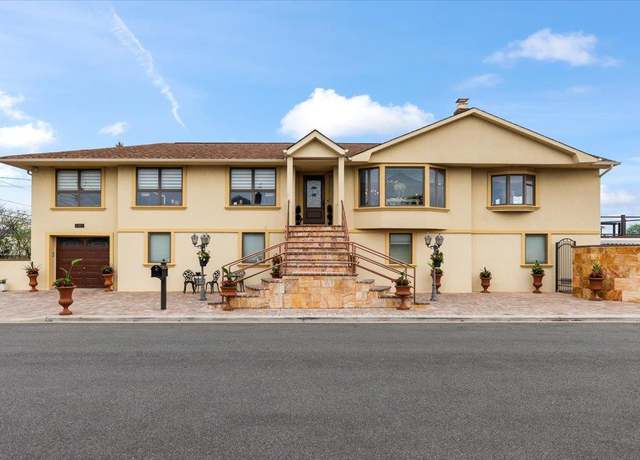 Property at 121 Atlantic Pl S, Island Park, NY 11558, 4 beds, 2 baths
