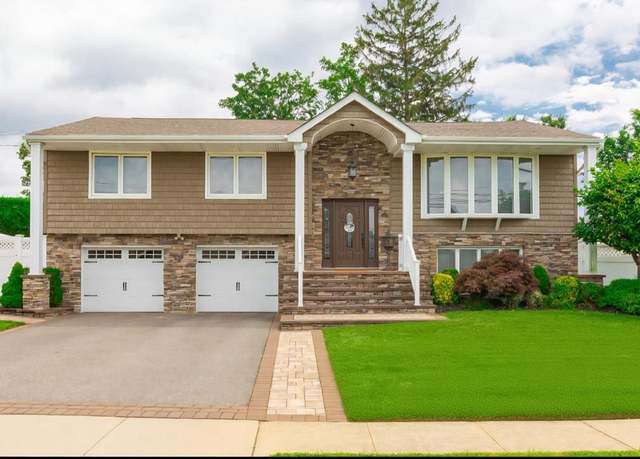 Property at 11 Larch Ln, Massapequa Park, NY 11762, 4 beds, 2.5 baths