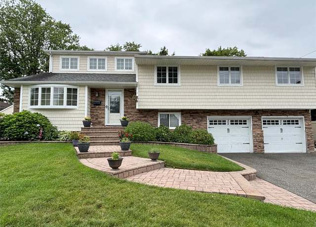 Property at 32 Sherman Dr, Syosset, NY 11791, 4 beds, 3 baths