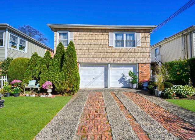 Property at 32-32 Plunkett Ave, Far Rockaway, NY 11691, 4 beds, 2.5 baths