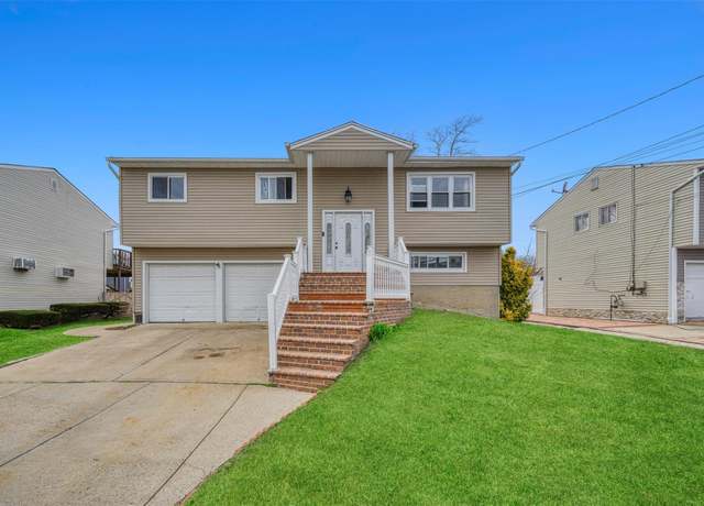 Property at 3 Ozone Pl, Massapequa, NY 11758, 4 beds, 2 baths