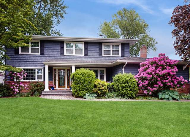 Property at 9 Ashford Dr, Lake Grove, NY 11755, 4 beds, 3.5 baths