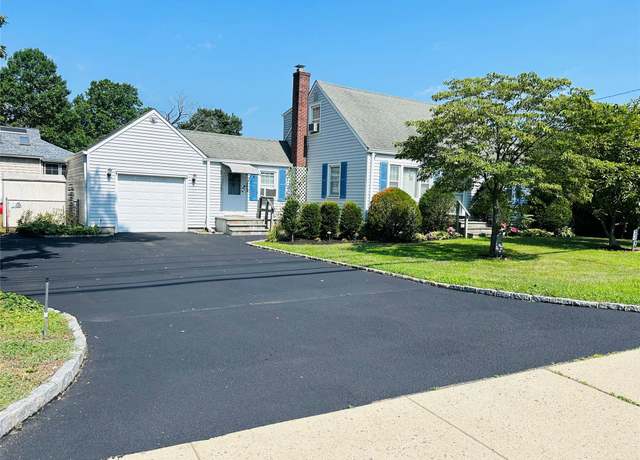 Property at 1547 Walt Whitman Rd, Melville, NY 11747, 4 beds, 2 baths