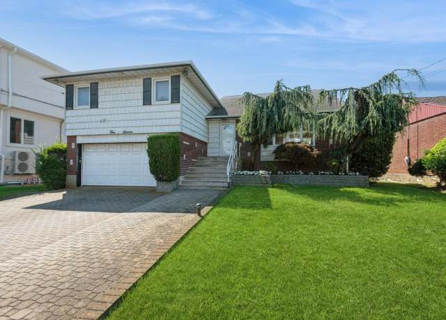 Property at 511 Redwood Dr, Cedarhurst, NY 11516, 4 beds, 3.5 baths