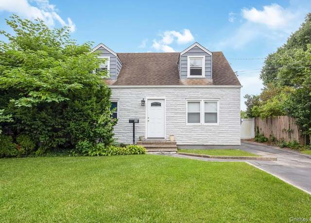 Property at 50 E 23rd St, Huntington Station, NY 11746, 4 beds, 2 baths