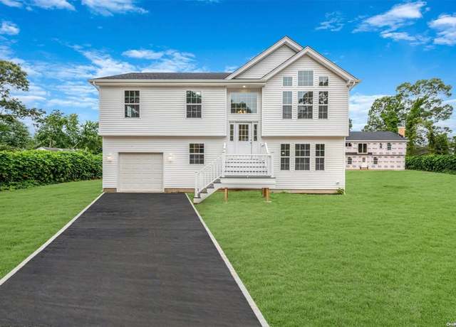 Property at 100 Daisy Dr, Mastic Beach, NY 11951, 4 beds, 3 baths