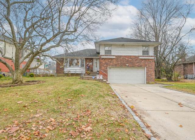 Property at 216 Birch Dr, New Hyde Park, NY 11040, 4 beds, 3 baths