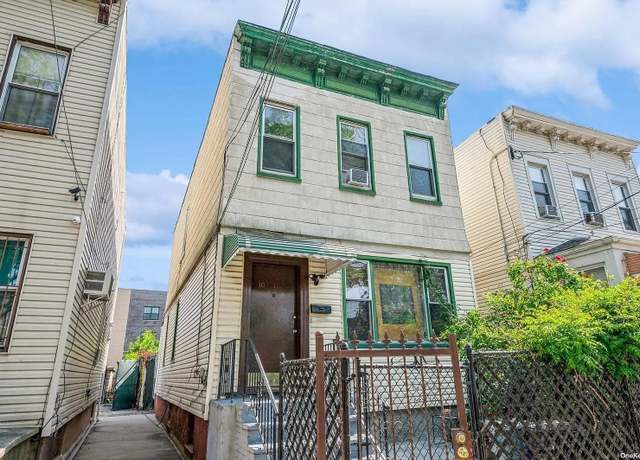 Property at 103-18 34th Ave, Corona, NY 11368, 4 beds, 3 baths
