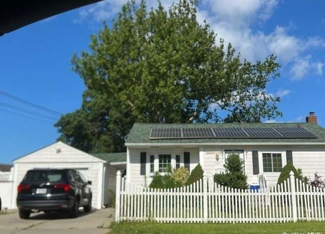 Property at 154 Charter Oaks Ave, Brentwood, NY 11717, 3 beds, 2 baths