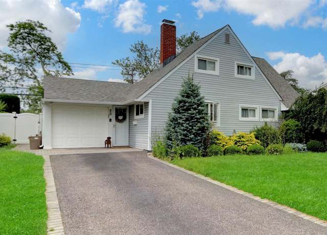 Property at 50 Pilgrim Ln, Westbury, NY 11590, 3 beds, 2 baths