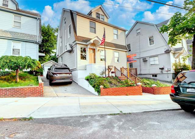 Property at 61-12 80th Ave, Glendale, NY 11385, 4 beds, 2 baths